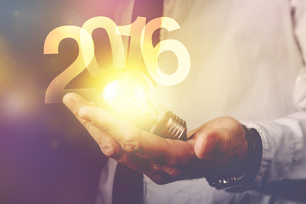 Happy new 2016 business year Happy new 2016 business year, businessman with light bulb and number 2016, retro toned image, selective focus.