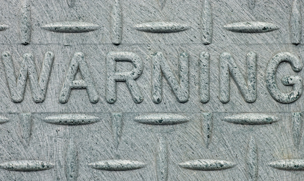 warning sign embossed warning sign on industrial background